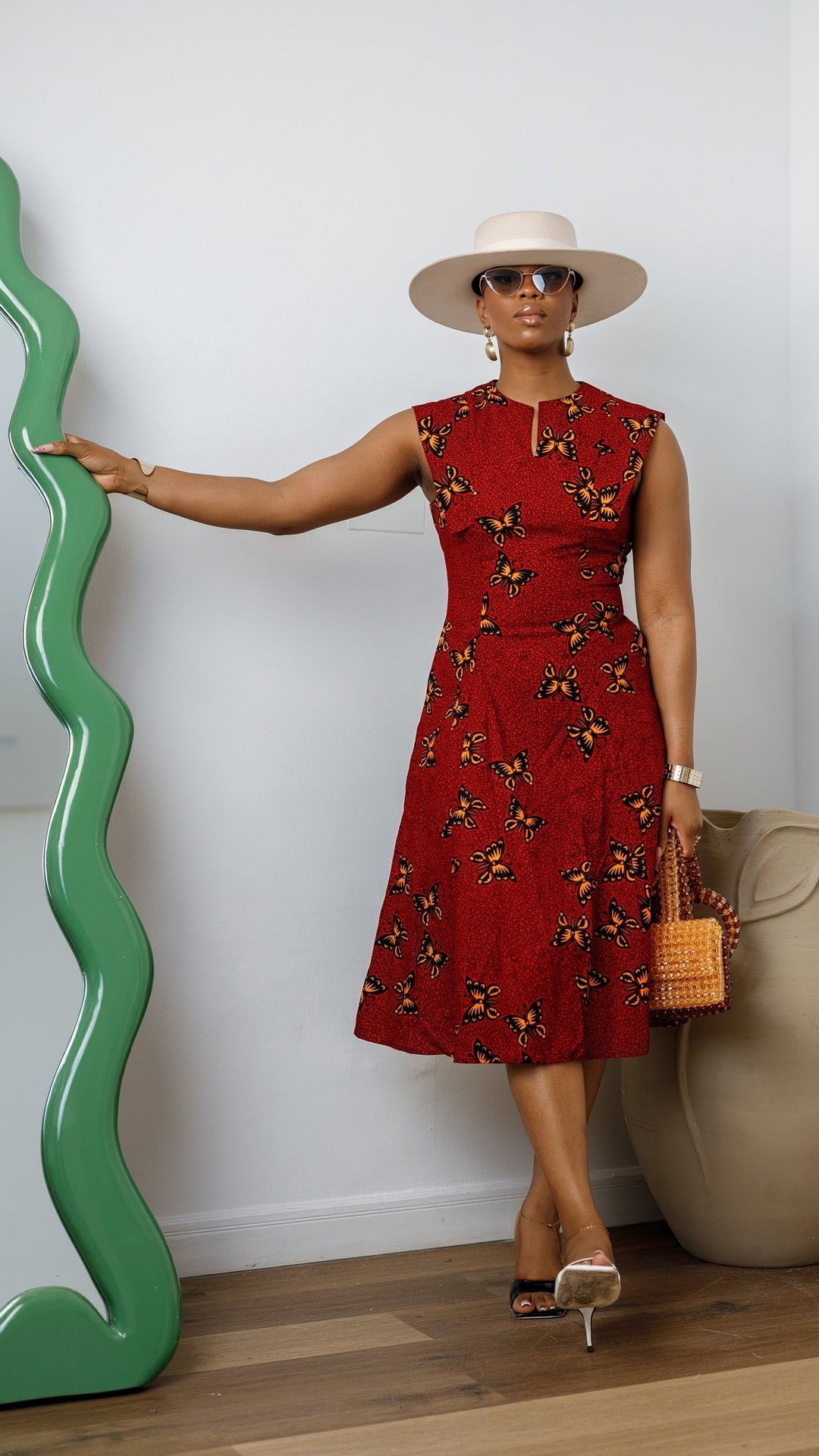 RAISA AFRICAN PRINT SLEEVELESS MIDI DRESS [RED]