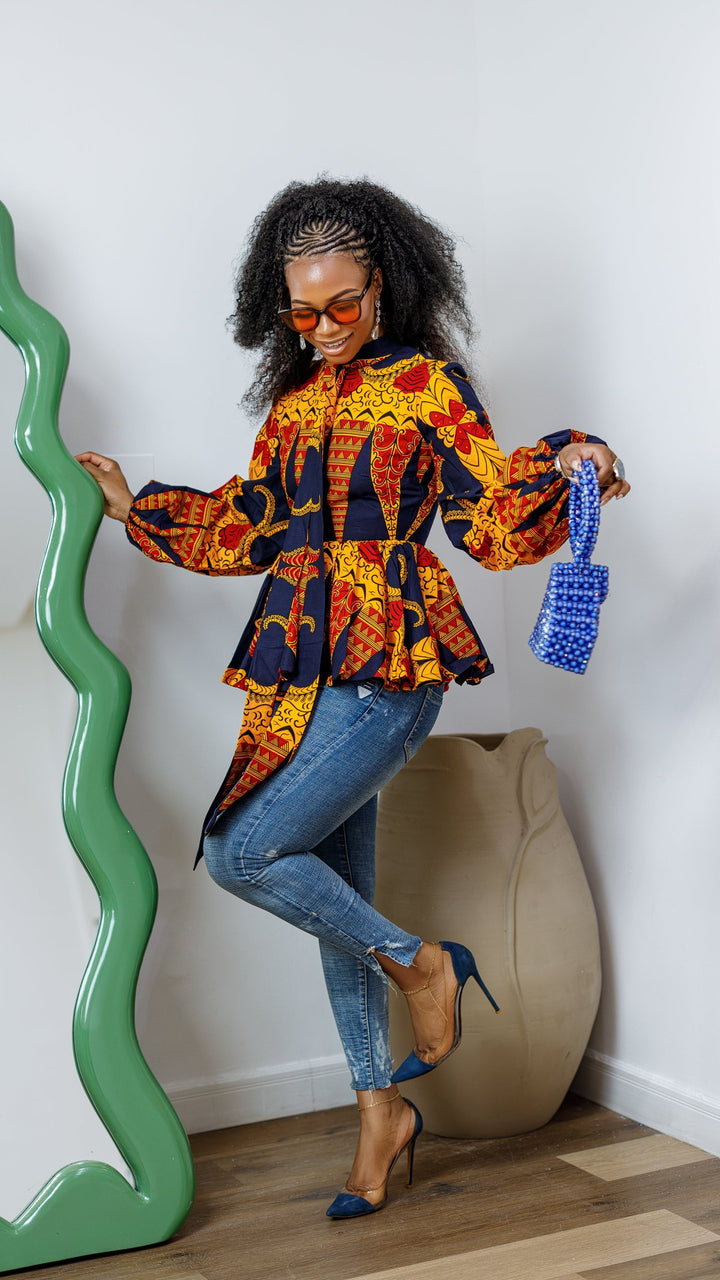 BIBI AFRICAN PRINT TIE NECK PEPLUM TOP [ORANGE]