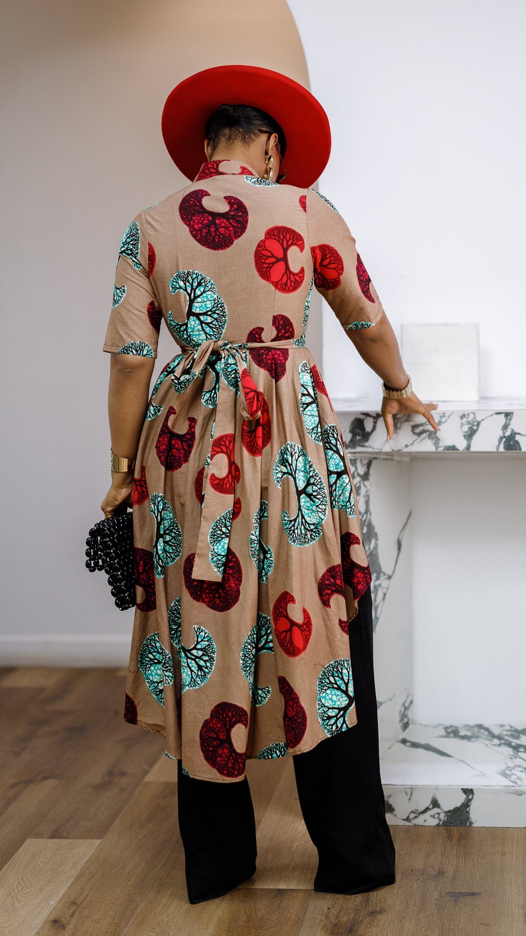 AFUA AFRICAN PRINT BUTTON-FRONT HIGH-LOW TOP [MULTICOLOR]