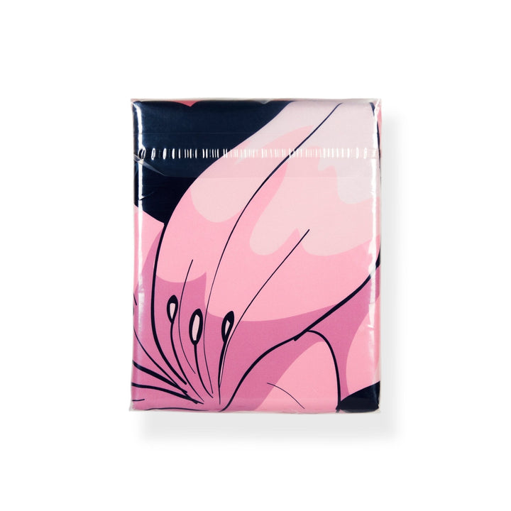 AFROBRATS Lily Duvet Set packaging – pink lily and navy print by Pardon My Fro | EY